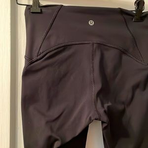 Lululemon cropped yoga pants, size 6, high waisted with sexy netting leg detail.